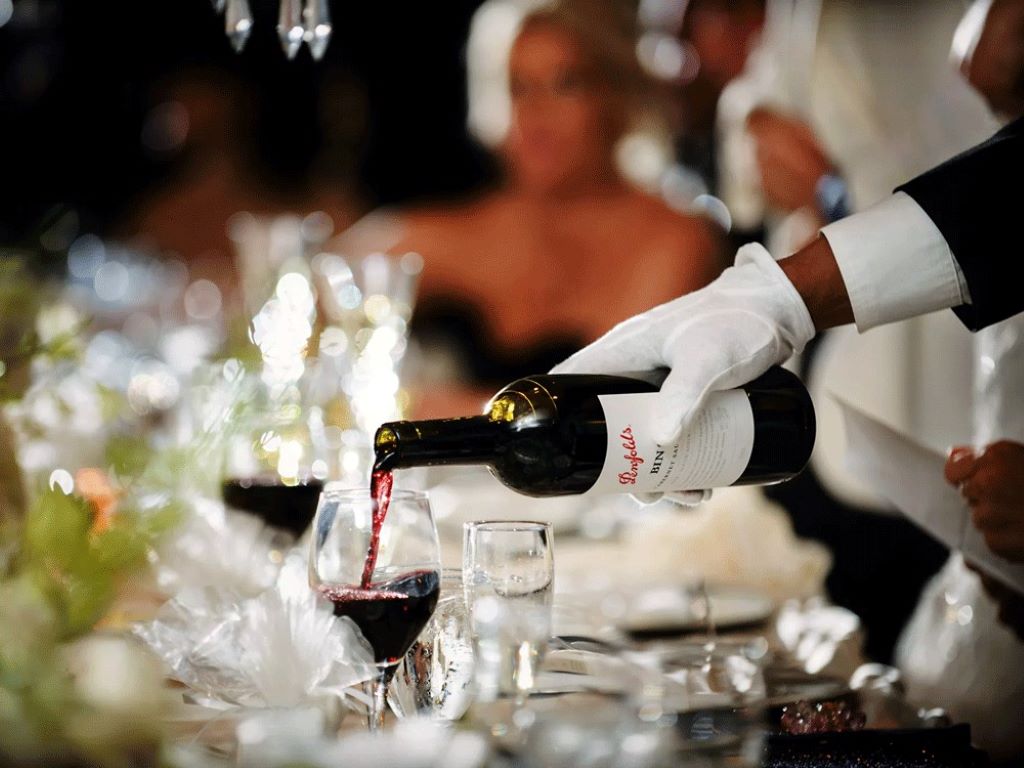 Red and white wine choices arranged for an elegant dinner event
